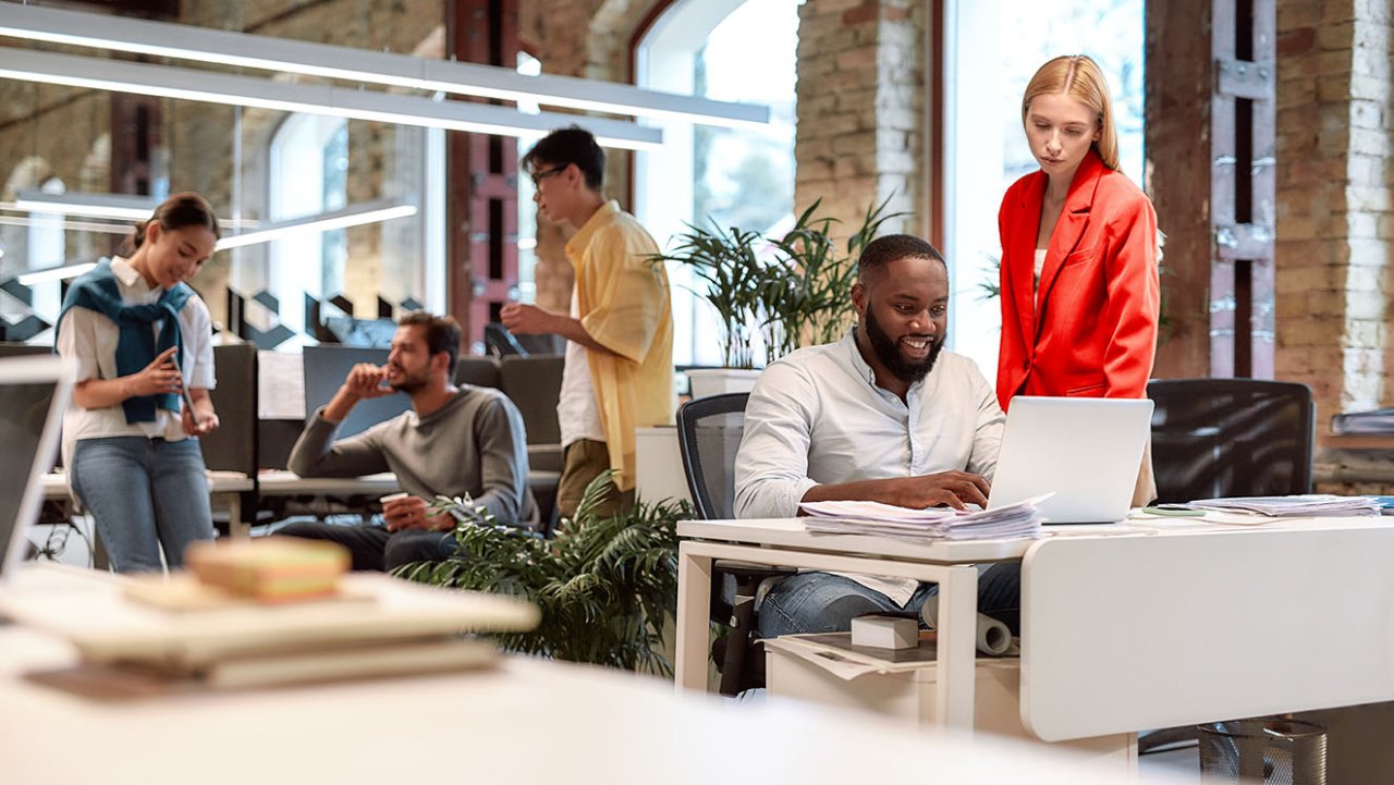 Coworkers working in office.