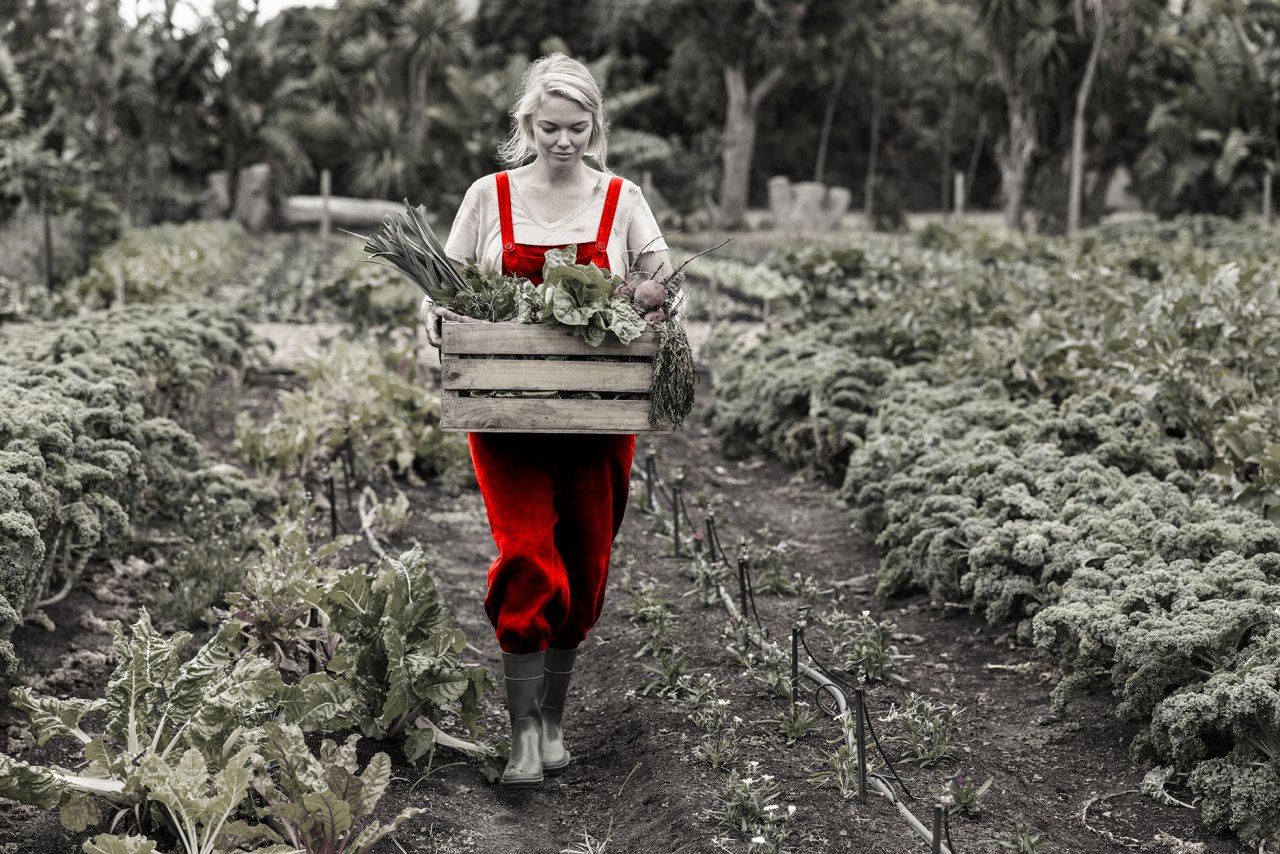 Woman gardening on a farm.